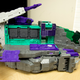 Pay no attention to Trypticon’s dinosaur face poking out the back.